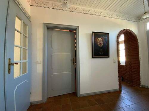 Zugang zur Treppe ins OG und Garderobe - 