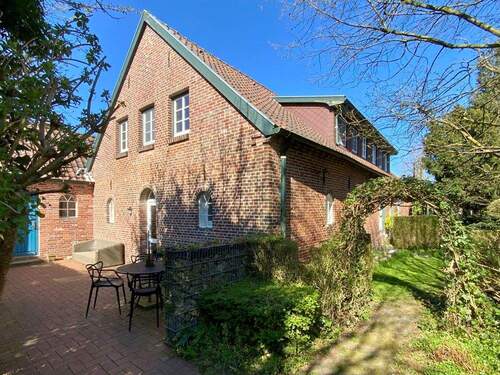 Rückwärtige Giebelansicht - Einfamilienhaus mit 220,70 m² in Jever zum Kaufen