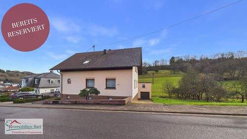 reserviert - BETHINGEN: GEPFLEGTES WOHNHAUS MIT 2 WOHNUNGEN 3 GARAGEN 2 CARPORTSTELLPLÄTZE