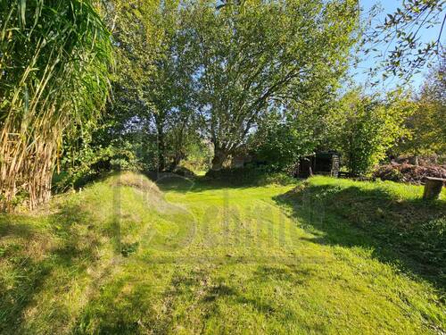 Garten - 9 Zimmer Mehrfamilienhaus, Wohnhaus zum Kaufen in Weener