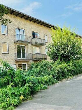 Hausansicht Kieler Straße Rückseite - Viel Platz samt großer Terrasse für Sie!