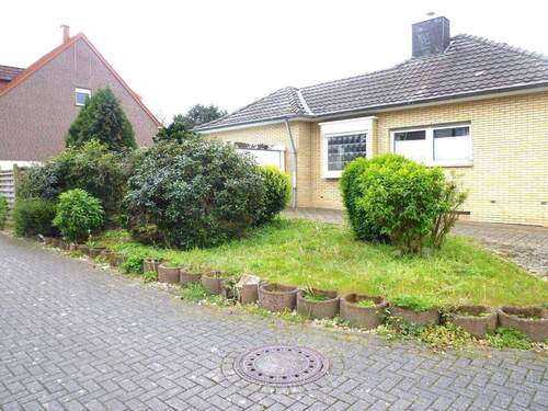  Seitenansicht mit zweiter Garage - Bungalow mit 150,00 m&sup2; in Baesweiler zum Kaufen