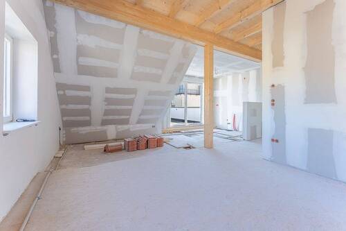 Wohnbereich mit Blick zur Küche - 