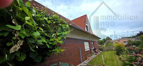 Ostansicht - 8 Zimmer Einfamilienhaus zum Kaufen in Ostrhauderfehn