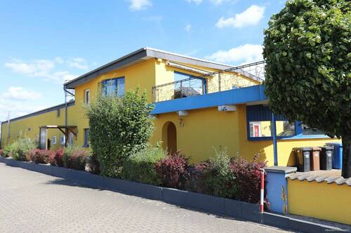 Rückseite Gebäude - Mehrfamilienhaus, Wohnhaus mit 119,40 m² in Isenbüttel zum Kaufen