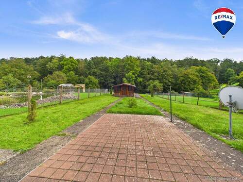 RE/MAX Immobilien DeLux Einfamilienhaus Nalbach Garten - 