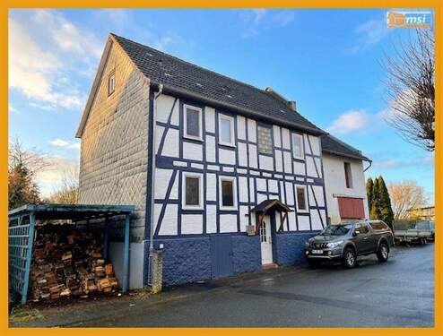 Vorderansicht - KOMPAKTES HANDWERKERHAUS MIT GARTEN! KEINE KÄUFERPROVISION!