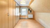 1. OG Schlafzimmer 1 - 