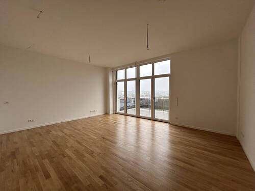 Wohnzimmer-Muster - Erstbezug in Aalen: 2,5-Zimmer-Wohnung mit Küche