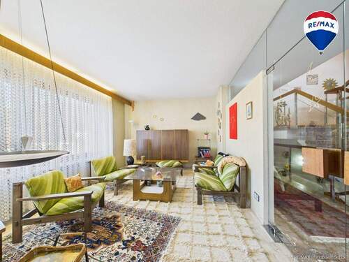 RE/MAX Immobilien DeLux Wohn-Geschäftshaus Merzig Wohnzimmer - 