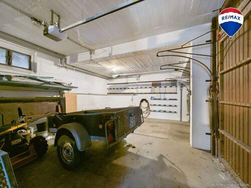 RE/MAX Immobilien DeLux Wohn-Geschäftshaus Merzig Garage - 