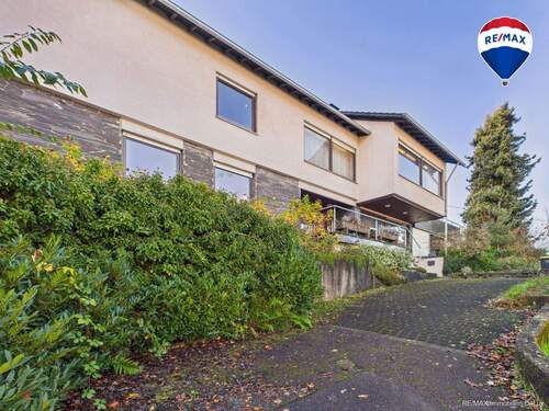 RE/MAX Immobilien DeLux Wohn-Geschäftshaus Merzig - 1 Zimmer Mehrfamilienhaus, Wohnhaus zum Kaufen in Merzig