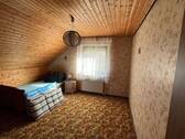 Zimmer im Dachgeschoss - 
