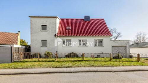 Außenansicht 1 - Ideale Familienimmobilie: Einfamilienhaus mit Garten und viel Potenzial auf 1.056 m² Grundstück