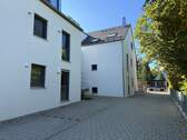 Einfahrt zu den Carports - 