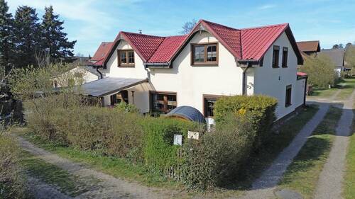 Ansicht Haupthaus - Wohnen und Vermieten mit 4 Einheiten in idyllischer Lage am Wasser