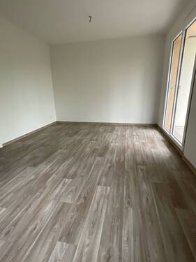 Muster Wohnzimmer - Etagenwohnung mit 55,80 m² in Bitterfeld-Wolfen zur Miete
