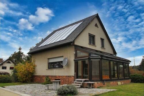 Rückansicht der Immobilie - 4 Zimmer Einfamilienhaus in Felixsee