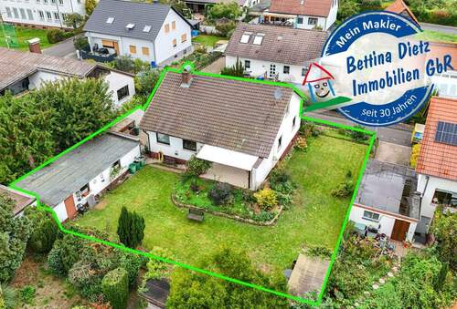 Außenansicht - DIETZ: Bungalow mit gepflegtem Garten und großer Garage und ausbaufähigem Dachgeschoss! Gute Lage!
