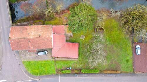 Vogelperspektive - Einfamilienhaus mit 214,00 m&sup2; in Dellfeld zum Kaufen