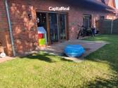 Garten mit Zugang zum Wohnzimmer - Erdgeschosswohnung mit Garten und Carport zu vermieten!