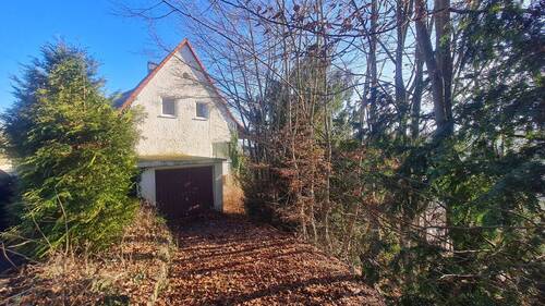 Westansicht mit Garage - 