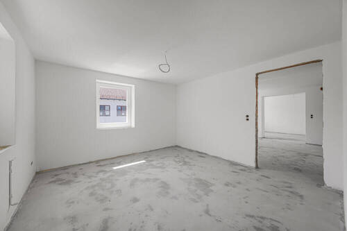 Schlafzimmer im Obergeschoss - Mehrfamilienhaus, Wohnhaus mit 184,00 m² in Velden zum Kaufen