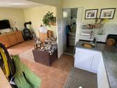 Küchenbereich mit Blick zum Bad und das Wohnzimmer - 