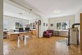 Wohnzimmer im EG mit Kaminofen - 