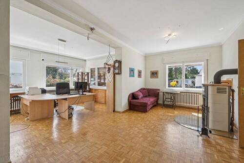 Wohnzimmer im EG mit Kaminofen - 