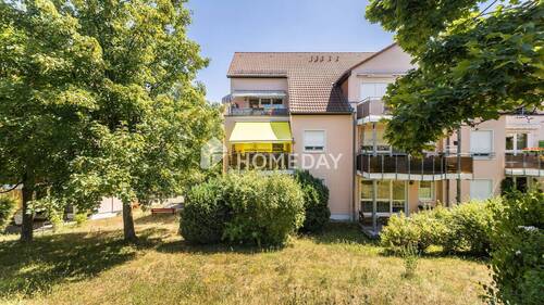 Garten 2 - Modernisiert & sehr gepflegt: Dachgeschosswohnung mit 3 Zimmern, EBK und Stellplatz in ruhiger Lage