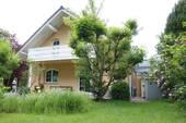 Rückansicht mit Balkon - 5 Zimmer Einfamilienhaus zum Kaufen in Berlin