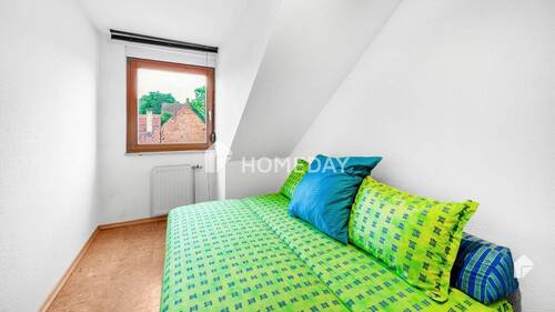 Schlafzimmer 1 - Gemütliches Wohnen im DG mit viel Licht und Flair