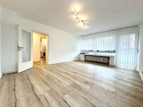 Wohnzimmer - 3 Zimmer Etagenwohnung zum Kaufen in Kaarst