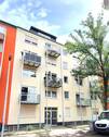 Haus Außenansicht 1 - 2-Zimmer-Eigentumswohnung mit Balkon und Einzelgarage in Mannheim-Rheinau