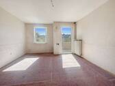 Schlafzimmer mit Zugang zum Balkon - 