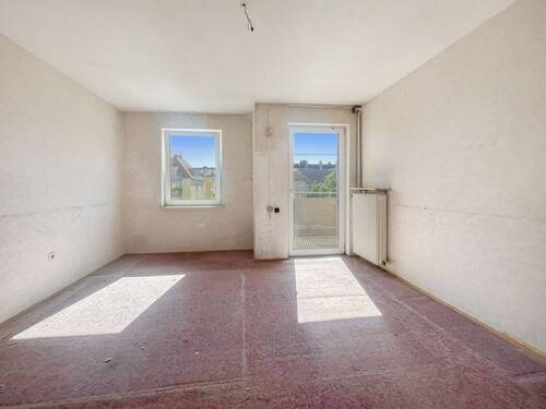 Schlafzimmer mit Zugang zum Balkon - 