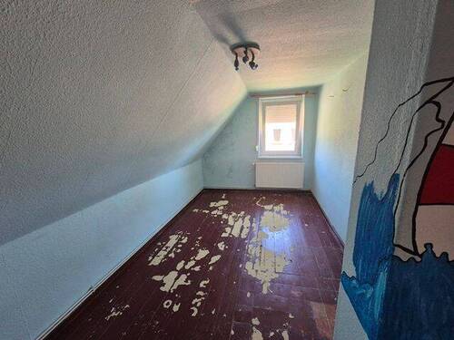 Schlafzimmer im Dachgeschoss - 