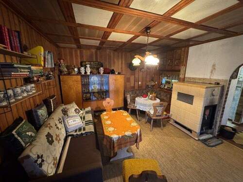 Wohnzimmer mit Kachelofen - 