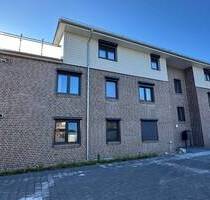 Vermietete Neubau-3-Zimmer-Wohnung (KfW 40) mit PKW-Stellplatz in Uetersen