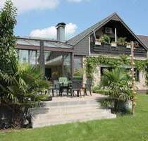 Bungalow mit großem Wintergarten und Einliegerwohnung in Rheinberg-Ossenberg, Grundstück 1399 m²