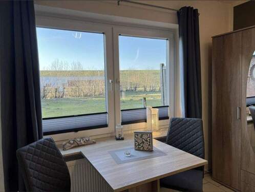 Wohnzimmer/ Essbereich - 1 Zimmer Etagenwohnung in Friedrichskoog