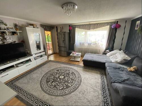 Wohnzimmer mit Ausgang Balkon - Etagenwohnung mit 87,00 m&sup2; in Kehl zum Kaufen