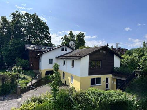Bild 1 - Wohnen. Arbeiten. Vermieten. - Vielseitiges Anwesen mit Gestaltungsspielraum