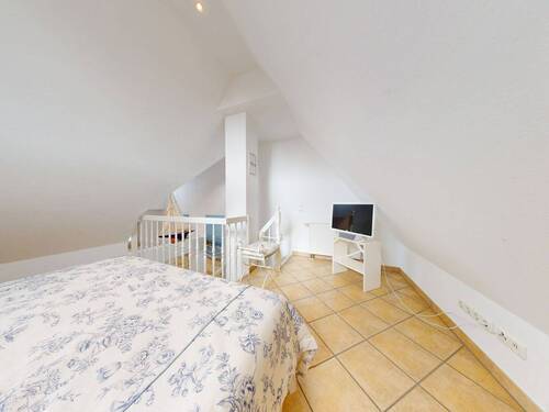 Schlafbereich im Spitzboden - 