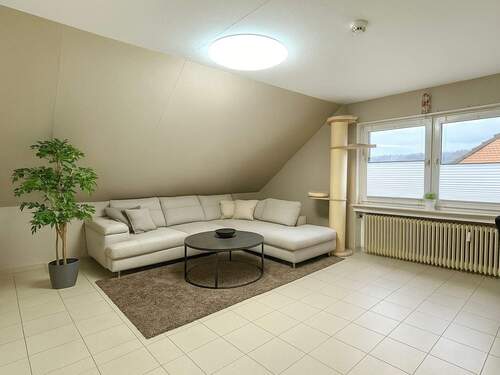 Wohnzimmer visuell - Mehrfamilienhaus, Wohnhaus in Hasbergen zum Kaufen