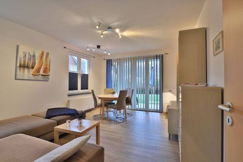 Wohnbereich mit Zugang zur Terrasse - 