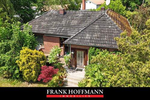Titelbild - Einfamilienhaus auf großem Grundstück in Henstedt-Ulzburg (OT Rhen)
