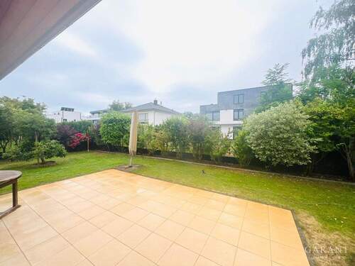 Terassenansicht - Mehrfamilienhaus, Wohnhaus mit 207,00 m&sup2; in Potsdam - Groß Glienicke zum Kaufen