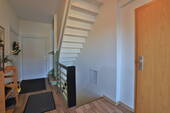 Treppenhaus 1. Obergeschoss, Wohnung links - 